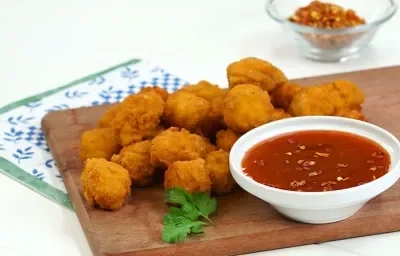 Palomitas de pollo con salsa agridulce