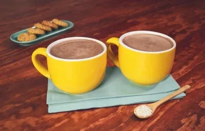 ATOLE de CHOCOLATE con AMARANTO preparado con Chocolate para Mesa ABUELITA® Reducido en Azúcar