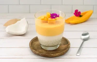 GELATINA de MANGO TAPIOCA preparada con Alimento a Base de Coco CARNATION® CLAVEL®